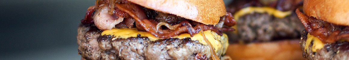 Eating Burger Hot Dog at Mixed Up Burgers restaurant in Grand Prairie, TX.